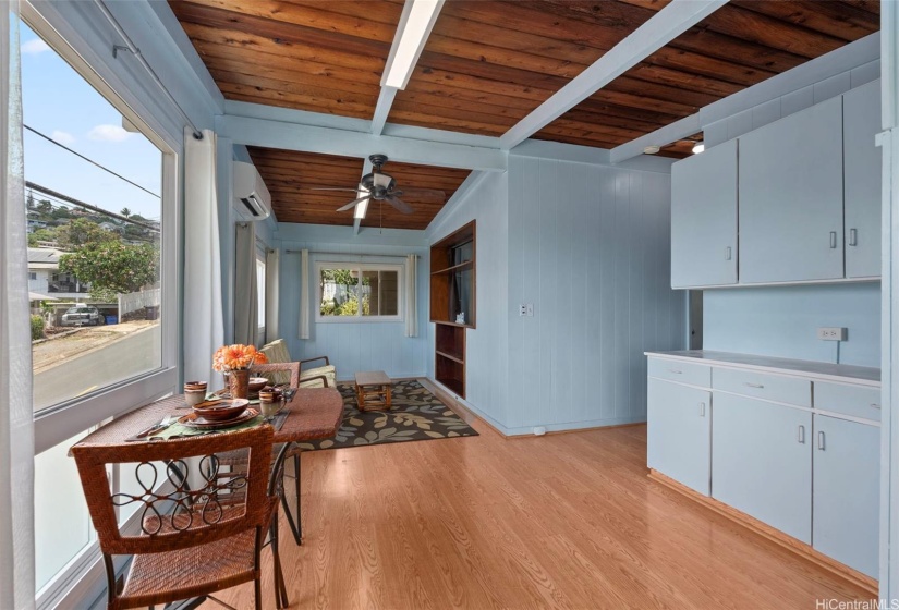 1/1 cottage, looking from the dining area towards the living room.  Note: double pane windows and split ac to keep you cool!