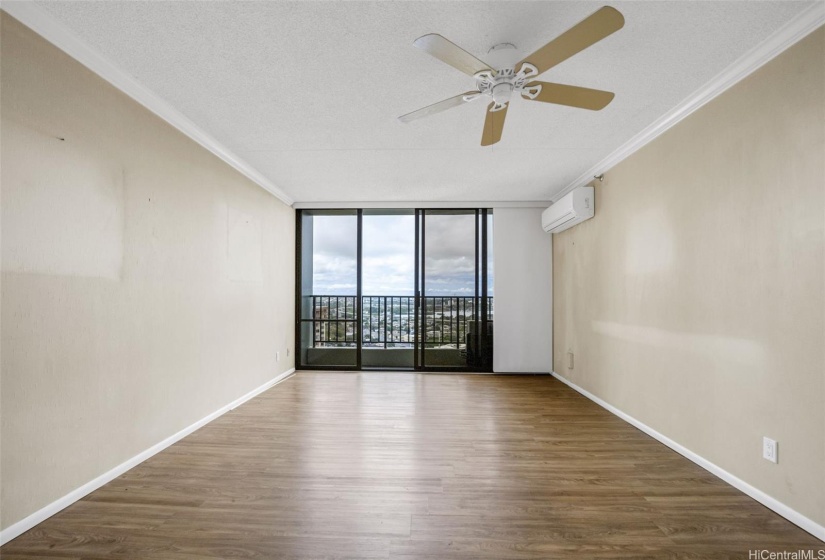 Living area with city, harbor, and ocean views.