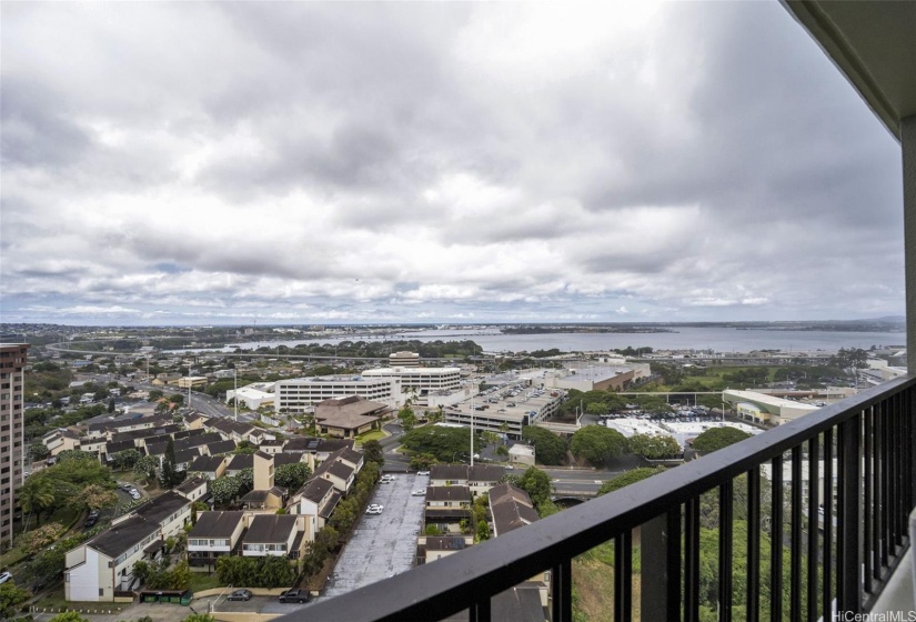 City, harbor, and ocean views from balcony.