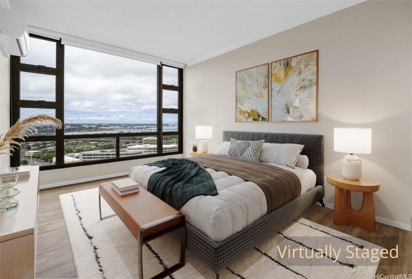 Bedroom with city, harbor, and ocean views.