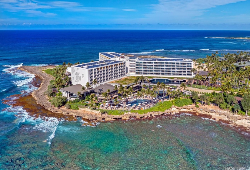 The gorgeous turquoise water that fronts the resort is a fantastic place to learn to surf or dine and have sunset cocktails