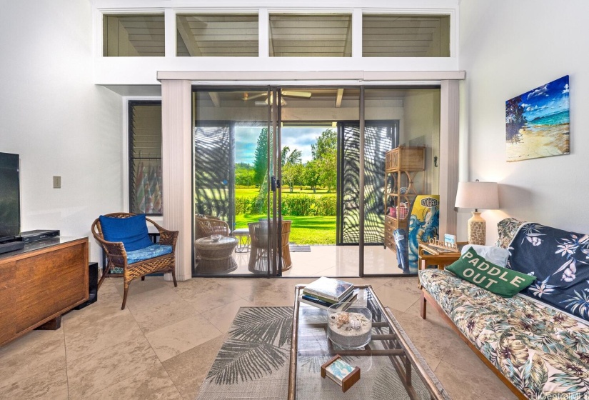 The living room at Kuilima Estates West with soaring ceilings and lots of with soaring ceilings and lots of natural light