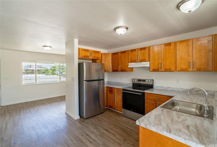 Another view of kitchen in mauka unit.  (units are mirror images of each other, and both feature brand new stoves and refrigerators.)