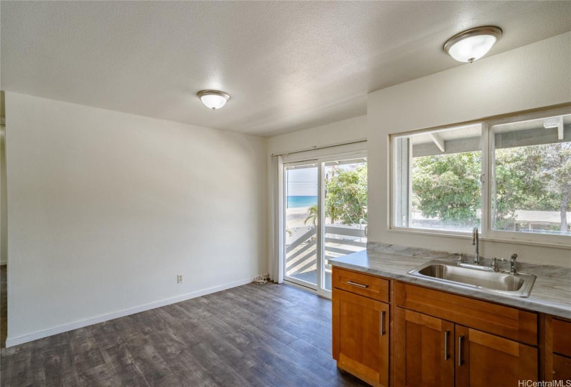 another view of kitchen in makai unit.  There are washer and dryer hook ups on the lanai behind the sink.