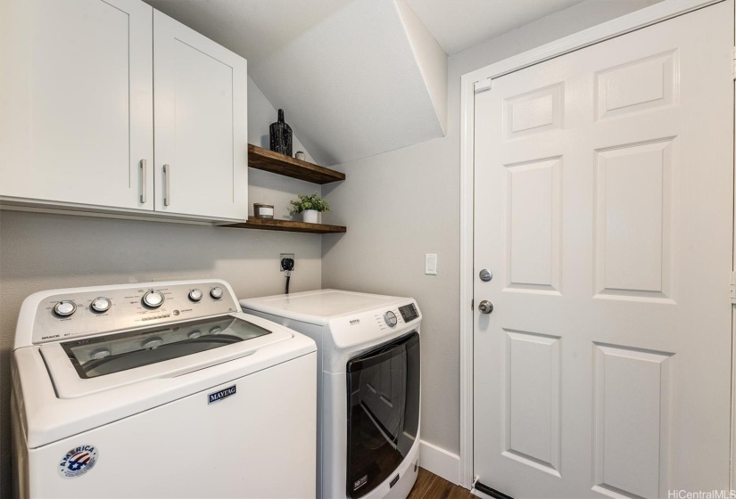 Laundry room leading to garage