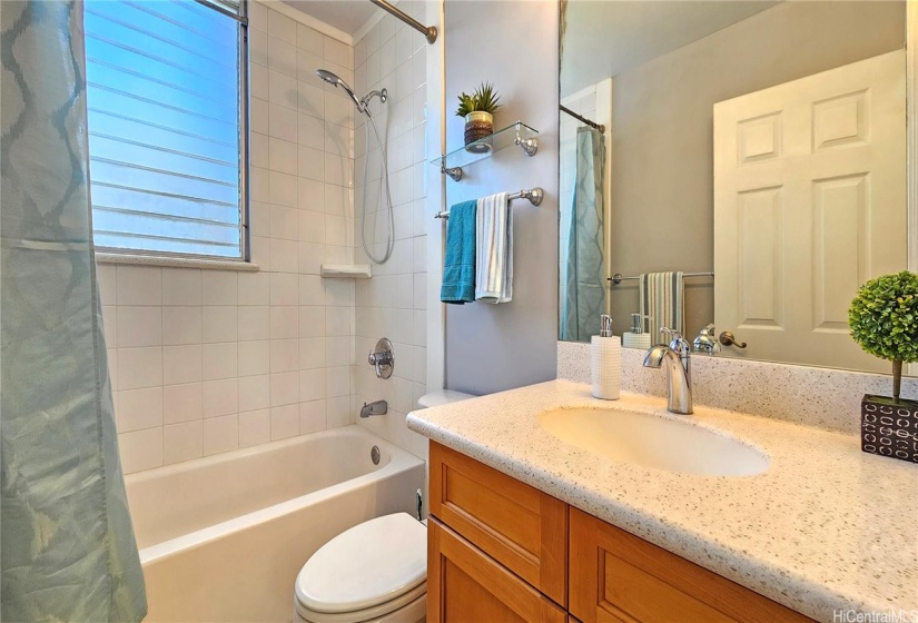 This corner unit has a window that brings in lots of sunlight and ventilation into the bathroom!