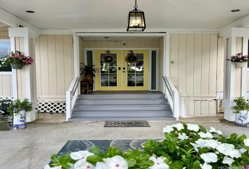 Double front doors give the home an open feel