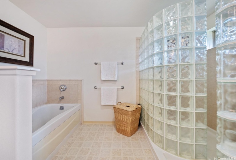 Primary Suite on 2nd floor:  Walk in shower and separate soaking jetted soaking tub