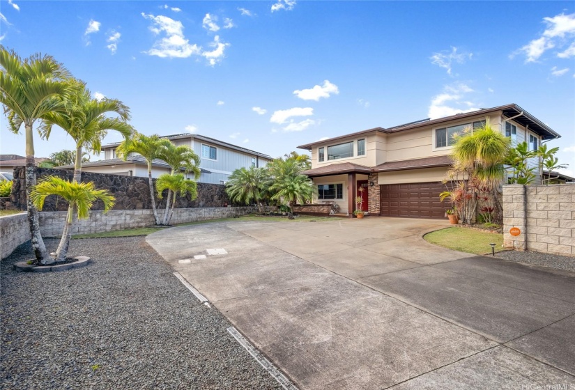 This home has a 3-car tandem enclosed garage.  The driveway was extended with room to turn around the car.  If you like to entertain, there is lots of onsite parking for your guest!