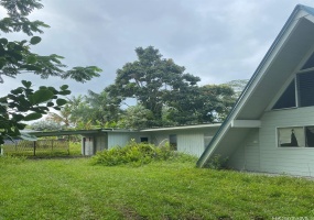 CARPORT AND FRONT ENTRANCE OF HOME