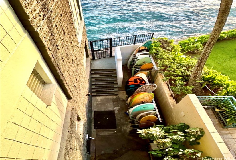 The building's surfboard storage in conveniently located next to the seawall for easy ocean access.