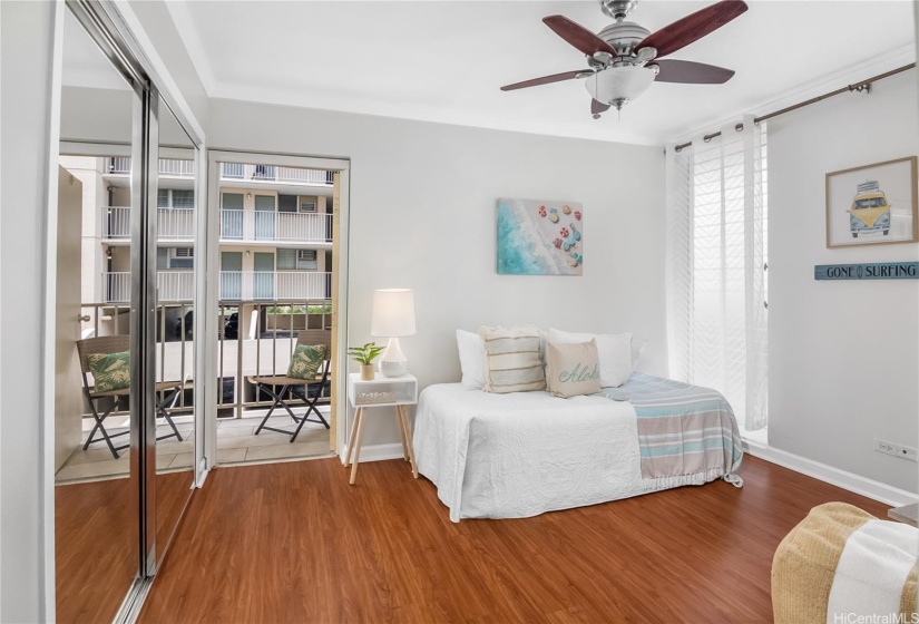 Bedroom #2 with lanai entrance (door open)