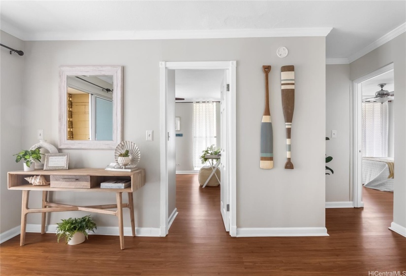 Living room showing both bedroom entrances.