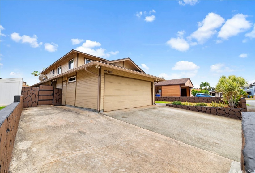 Front exterior of home allows for additional parking.