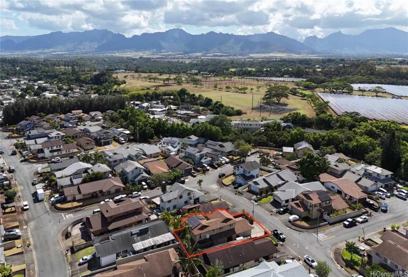 Aerial view and mountains in the background.