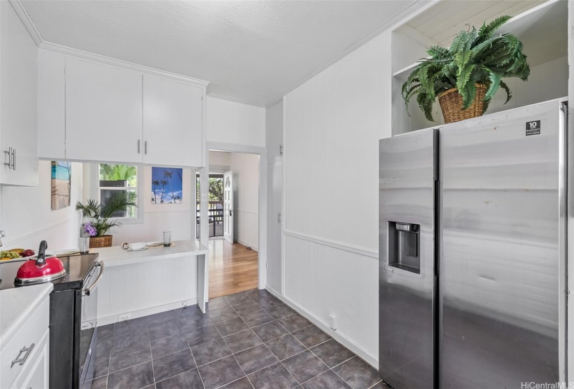 Kitchen has been partially remodeled with a new countertop, sink & Cabinetry.