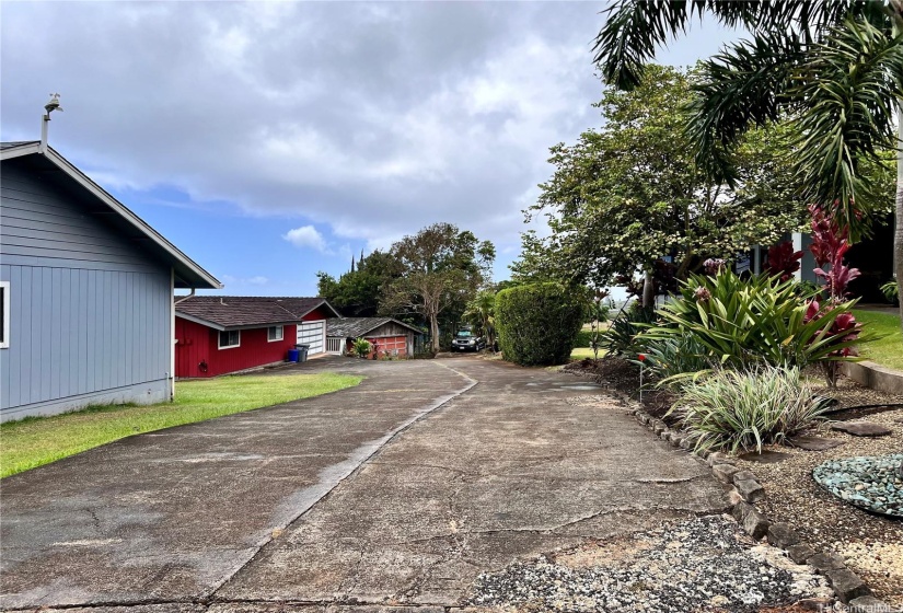 Right side of drive way belongs to the property