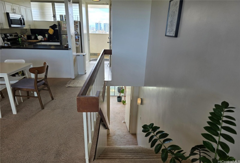 Yes, this is a split-level one-bedroom apartment with the stairs leading down. Other units the stairs goes up.