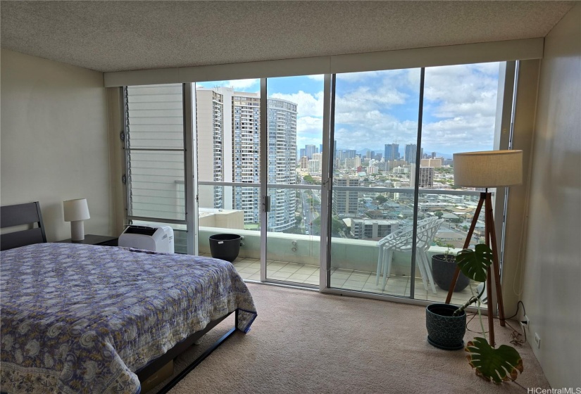 The bedroom is also on the lower level that offers another balcony with unobstructed views.