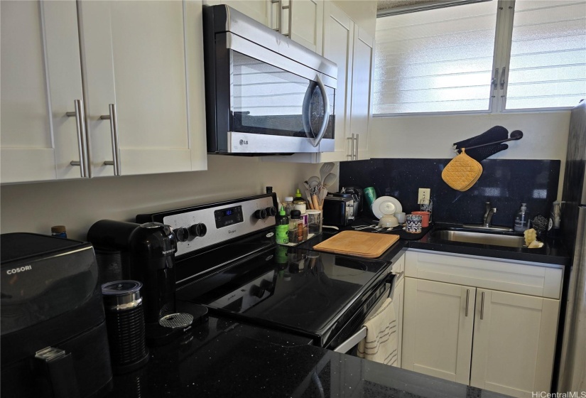 Kitchen offers stainless appliances.