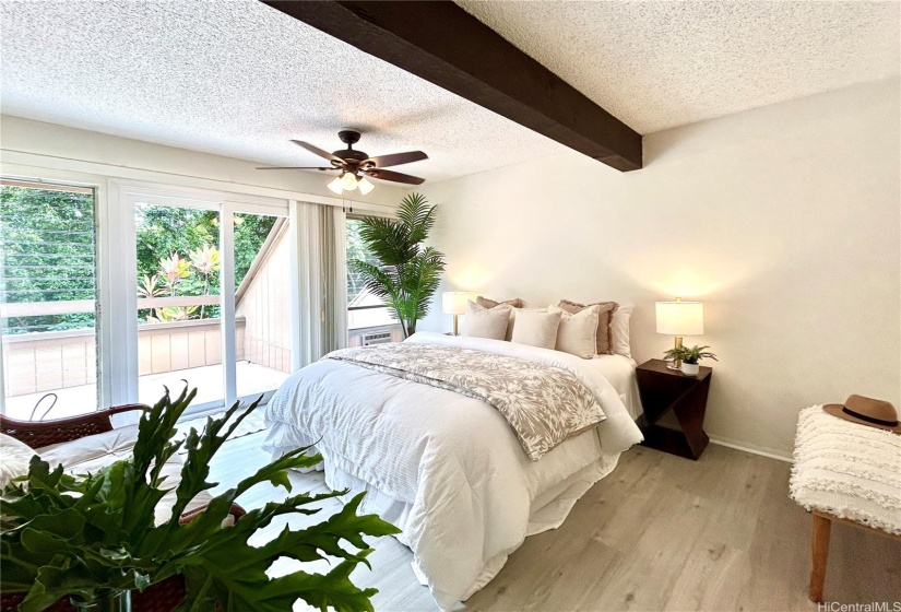 Main level bedroom with walk-in closet and large linen closet