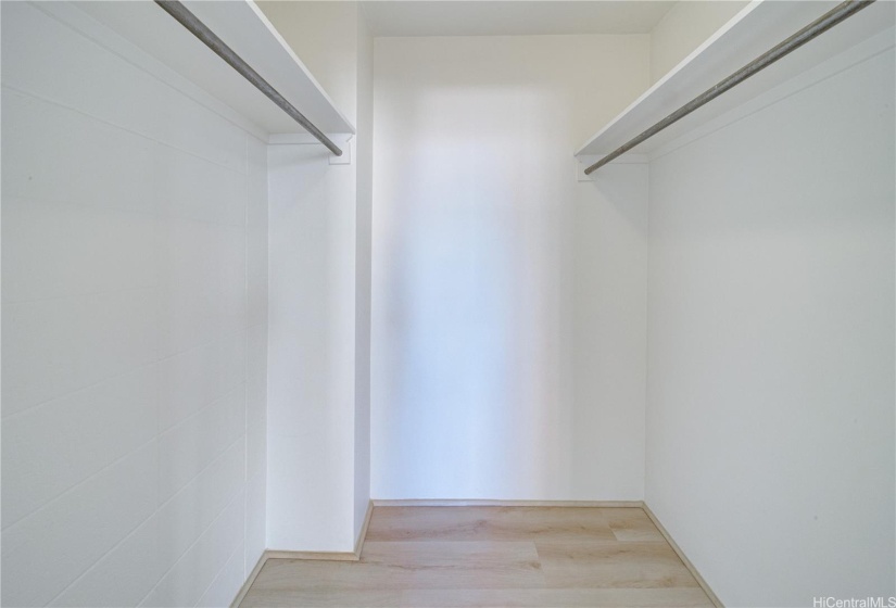 Walk in closet in bedroom