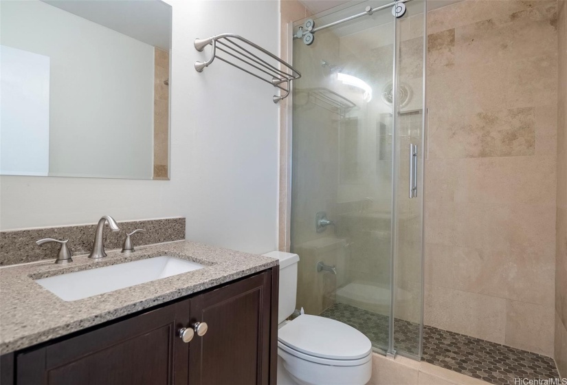 Primary bathroom with walk in shower.