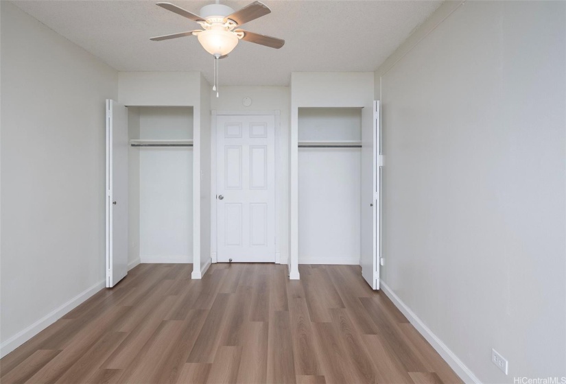 Bedroom #2 with ceiling fan/light and generous closet space.