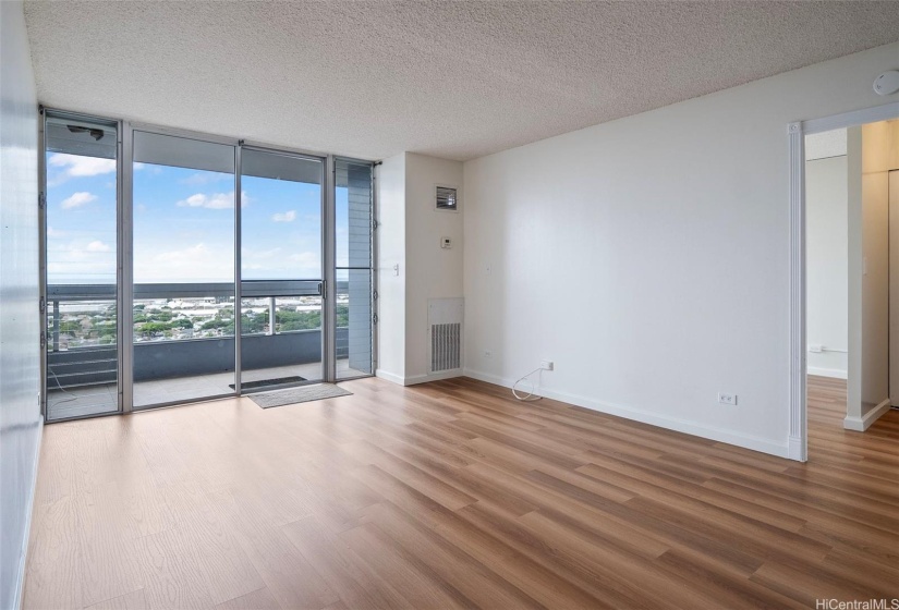 Living room with brand new LVT plank flooring.