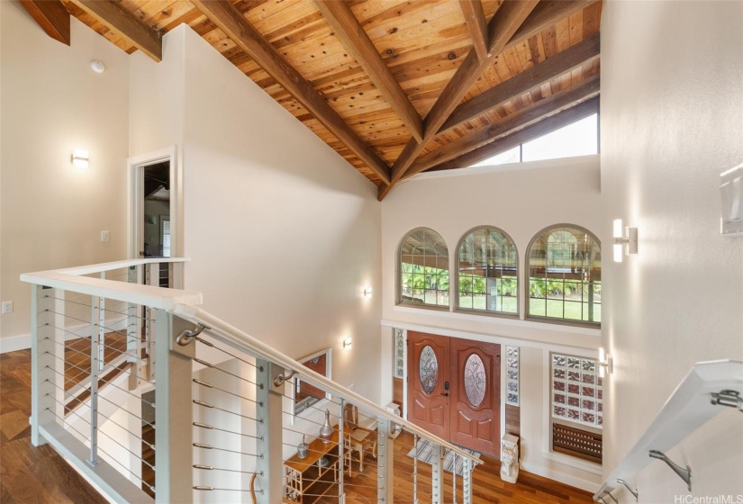 Upper Level looks down on Living Room and Entryway.  Cathedral Ceilings and LOTS of Light!