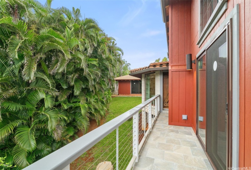 Primary Bedroom and Bath have their own exterior doors and stand-alone-2 car-Garage can be seen in the background!