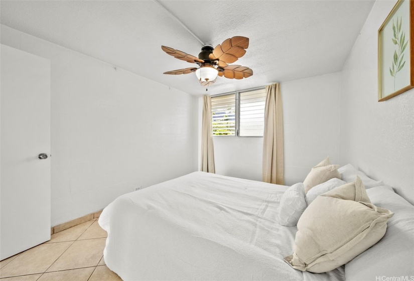 Freshly painted bedroom, with new ceiling fan!