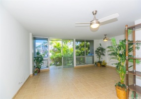 Pleasant surroundings with mature palms creating a lush tropical setting for its 103 sq.ft. useable lanai