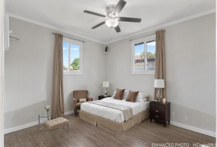 enhanced photo with virtual staging of another secondary bedroom