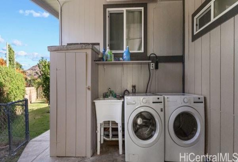 Newer washer and dryer. Vanity sink and water heater all right in the back yard.