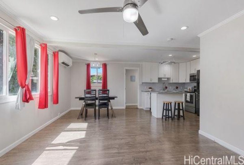 Living room area - actual. Note the luxury vinyl plank flooring throughout.