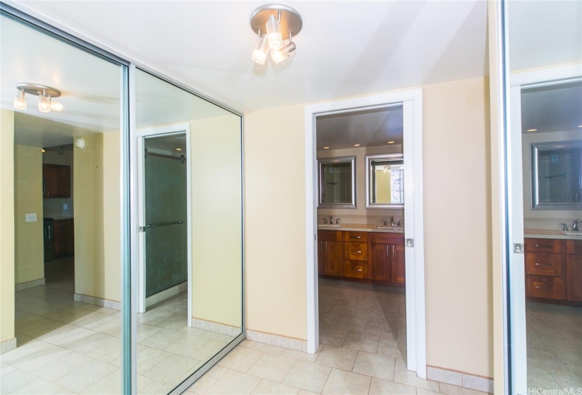 The roomy dressing area has two large closets