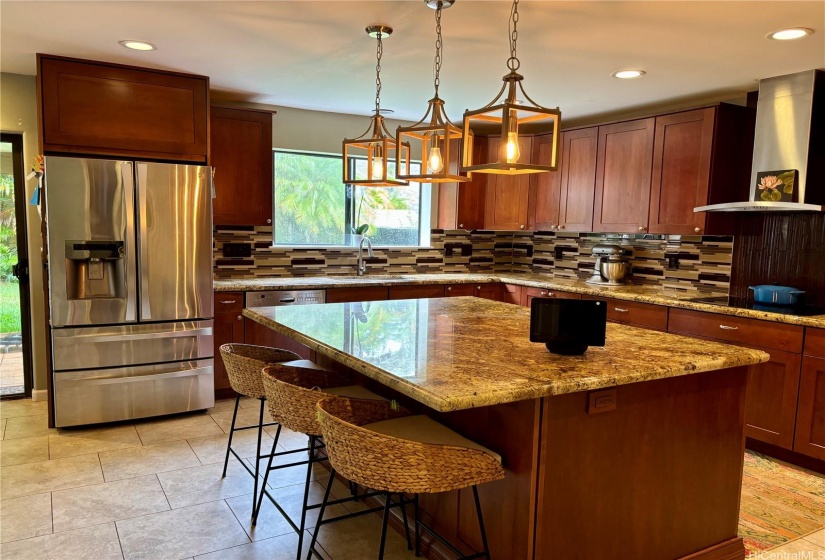 Beautifully appointed kitchen with ample cabinet space.