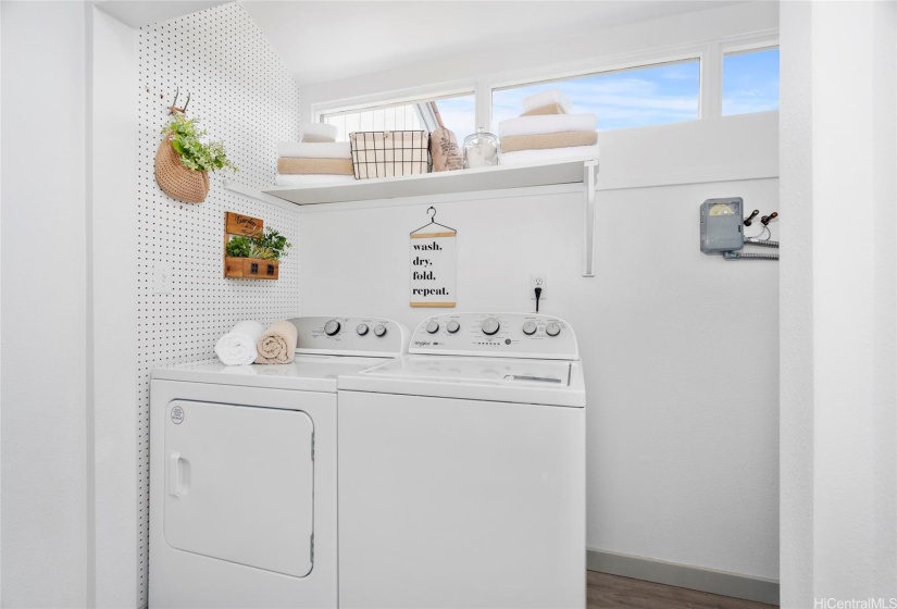 Dedicated laundry area and not pictured to the right is the electric water heater.