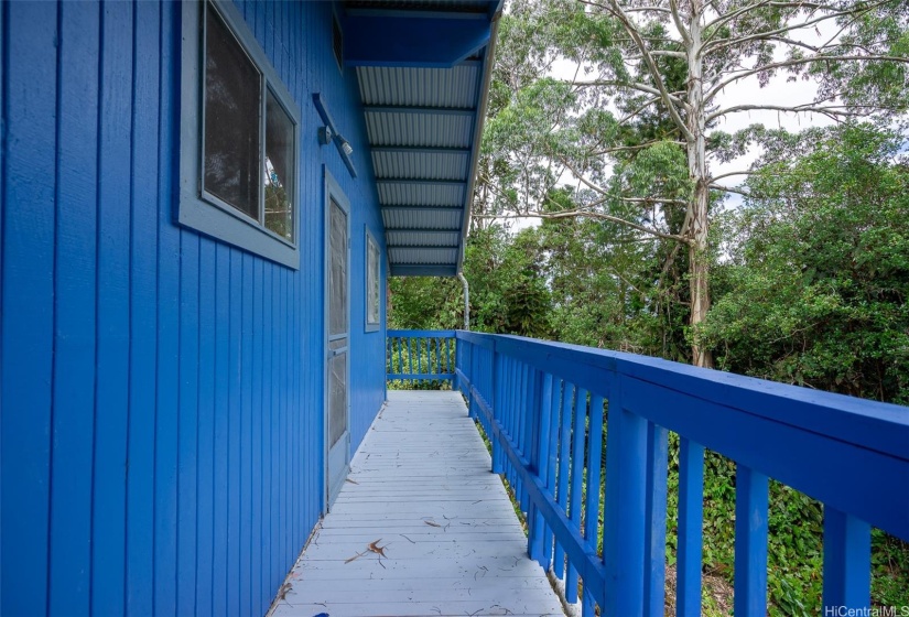 Wrap around second floor lanai side of house.