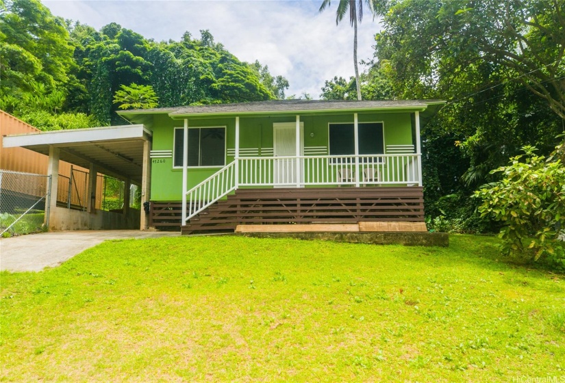 View of house, 2 car carport and spacious front yard