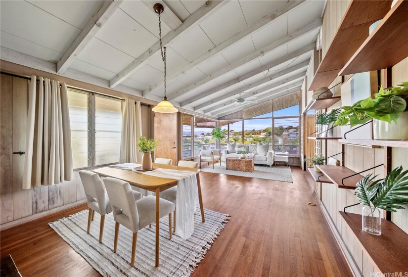 The kitchen leads to the living area.