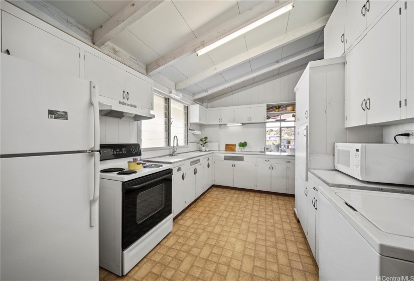 Upstairs layout allows for everyday entry directly into the kitchen and also a different entry into the living room area for guests.