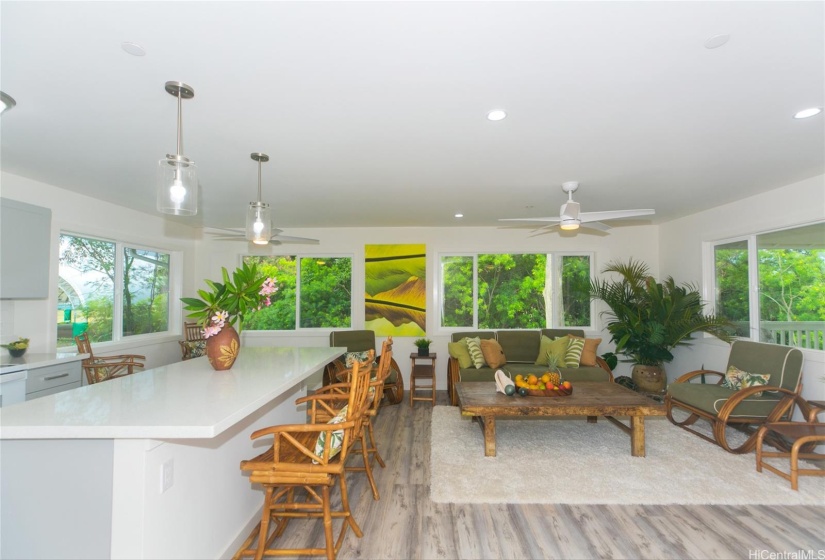 Upstairs Open kitchen on left, Living room and open Lanai to your right -   Ka'ohao Public Carter School back kitty corner of property.