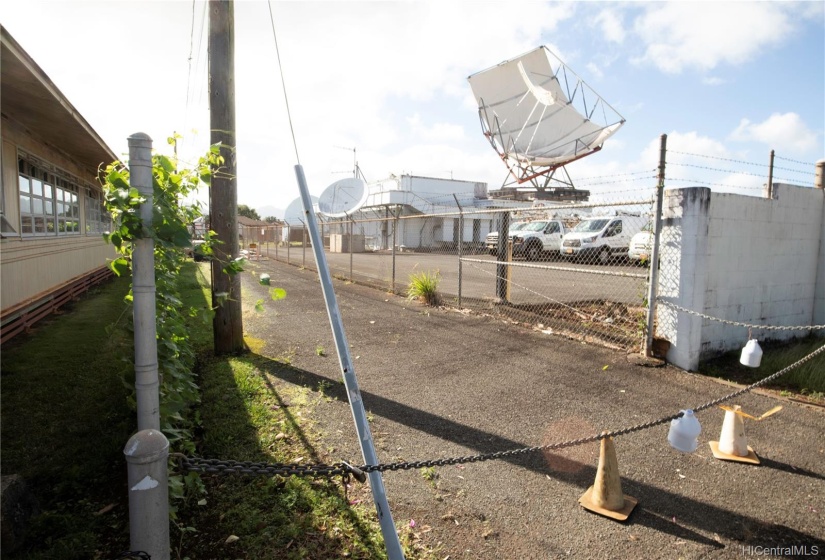 Another perspective of the driveway that is owned by the telephone company.  Their fence and CMU wall demarcates the driveway they allow our property owner to use.