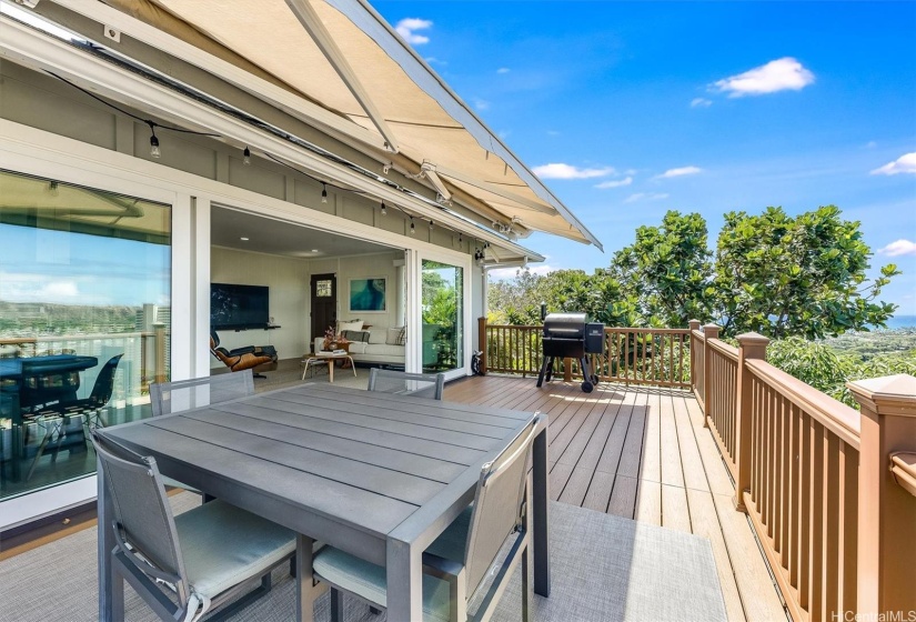 Fleetwood sliding doors and 220 sq. ft. lanai with Trek railings and planks, plus a retractable awning