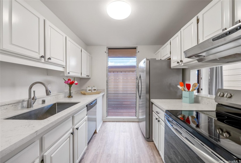 Brand new quartz counters. Freshly painted cabinets and stainless appliances.