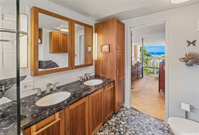 Enjoy the view from your Jacuzzi tub. Remodeled bath with double sinks and a resort feel.