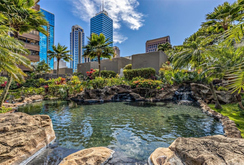 Amenity deck includes scenic walking/jogging paths complete with waterfalls & ponds.