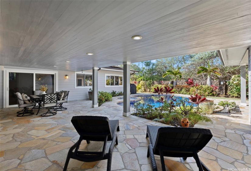 Expansive covered lanai, pool and Jacuzzi - perfect for entertaining, unwinding and indoor-outdoor living!